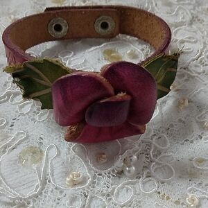Vibrant Purple Leather Bracelet with Floral Accent